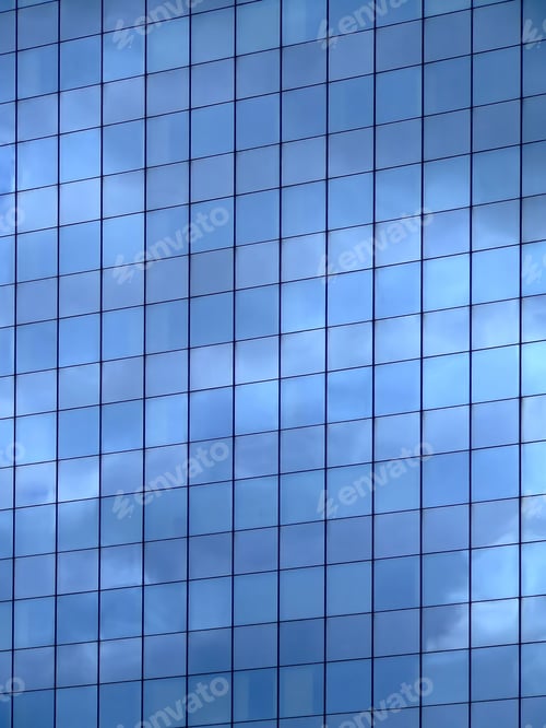 Preview: Vertical Image Of Sky Reflection On Glass Wall Building