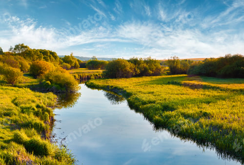Preview: Colorful Summer View Of The Small Valler River. First Sunlight Glowing Fresh Grass And Trees In The