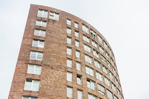 Preview: Low Angle View Of Modern Brick Office Building