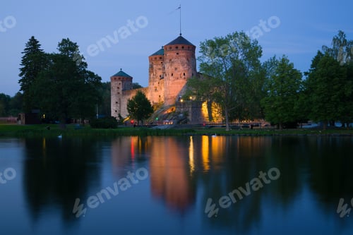 Preview: The Ancient Olavinlinna Fortress In July Twilight. Savonlinna, Finland