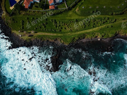 Preview: Aerial Top View Of Sea Waves Hitting A Beach With Black Volcanic Sand With Turquoise Sea Water