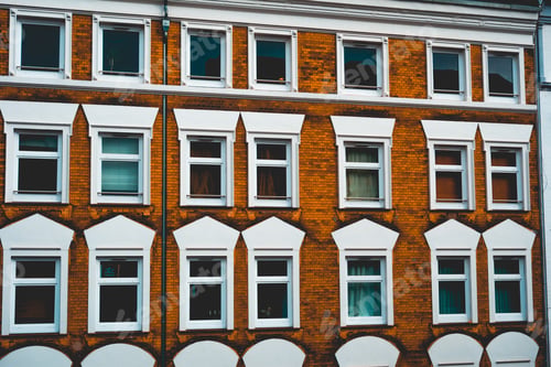 Preview: Orange Brick Facade With White Ornaments