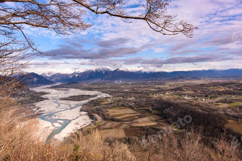 Preview: The Slow Flow Of The Tagliamento River Cradled By Its Mountains.