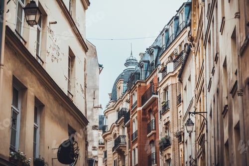 Preview: View Down Narrow Street Shaded By Tall Apartment Buildings With Domed Structure In The Middle
