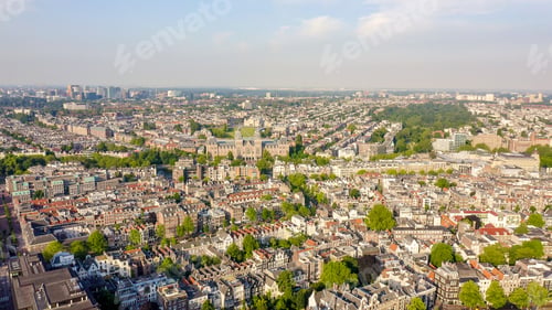 Preview: Amsterdam, Netherlands. Flying Over The Rooftops Of The City, Aerial View