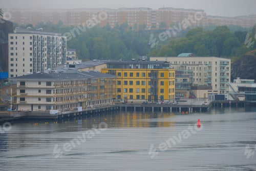 Preview: Modern Residential Complex On Stilts On The Banks Of The Fiord Foggy August Day. Stockholm, Sweden