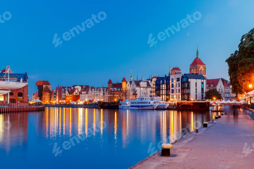 Preview: Multi-Colored Facades And Boat On The Central Waterfront In Gdansk At Night.