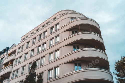 Preview: Beautiful Curvy Apartment Building With White Facade