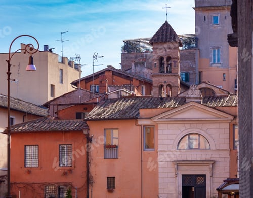 Preview: View Of The Tiled Roof Of The Old Cathedral Against The Blue Sky. Rome. Italy.