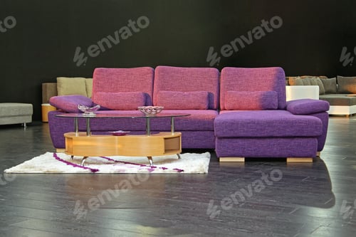 Preview: Big Purple Textile Sofa And Wooden Table