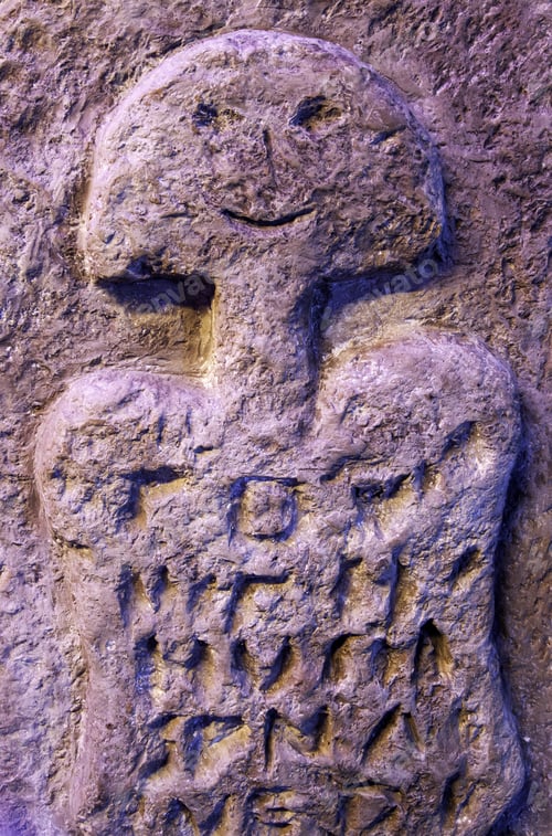Preview: Abstract Carving of a Figure with Writing