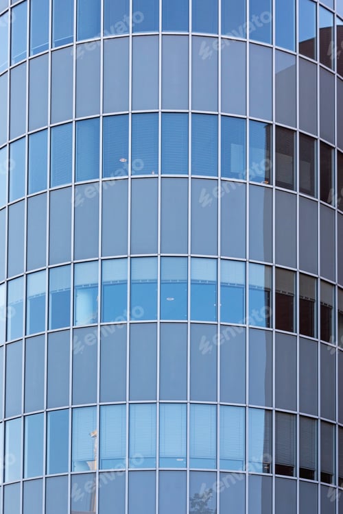 Preview: Curved Blue Glass Office Building Exterior