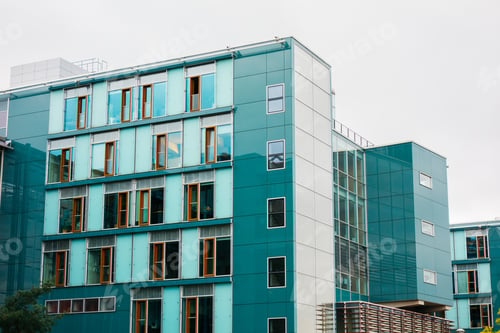 Preview: Modern Glass Facaded Office Building With Green Squares