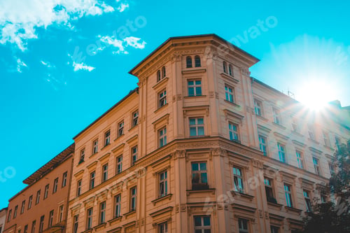 Preview: Orange Corner Building At Prenzlauer Berg With Sun On The Top