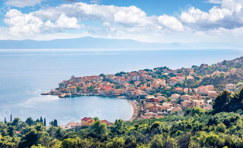 Preview: Misty Morning Cityscape Of Igrane Town, Croatia, Europe. Sunny Summer Seascape Of Adriatic Sea