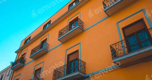 Preview: Orange House With Little Black Steel Balcony