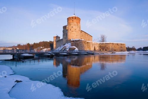Preview: View Of The Olavinlinna Fortress In The Light Of The Setting Sun On A March Evening. Savonlinna