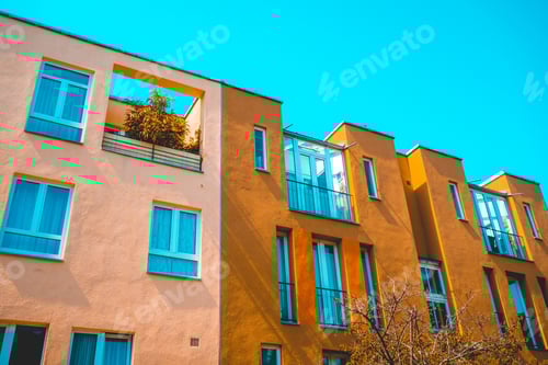 Preview: Real Estate Picture Of Modern Townhouses With Pink And Orange Facade