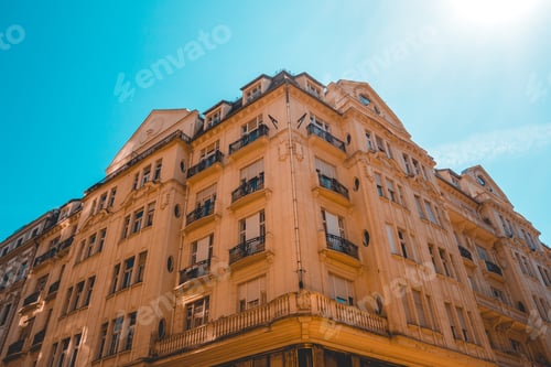 Preview: Orange Corner Building On A Sunny Day