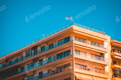Preview: Typical Apartment Building At Thessaloniki With Greece Flag On The Top