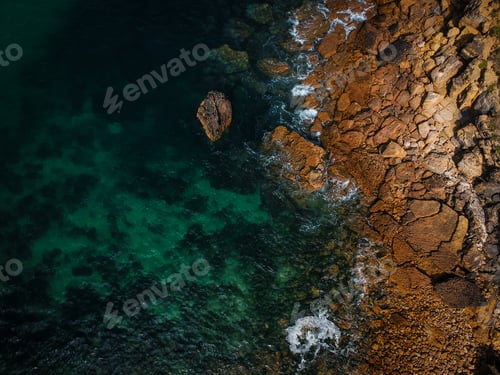 Preview: Aerial View Of Waves, Rocks And Transparent Sea. Summer Seascape. Top View From Drone. Rocky