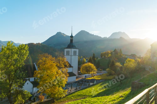 Preview: Landscape With A Traditional Church In The Misty Rays Of The Setting Sun And Autumn Forest