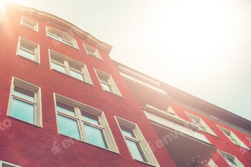 Preview: Very Low Angle View Of Red Facaded Apartment House