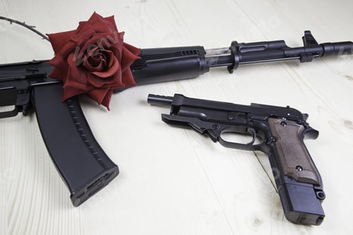 Preview: Machinegun And Gun With Red Flower On Them, Violence And Peace Symbolism