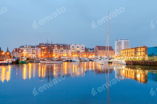 Preview: Multi-Colored Facades And Boat On The Central Waterfront In Gdansk At Night.