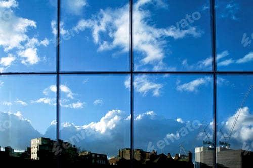 Preview: Window Reflection Of City Sky And Cloudscape