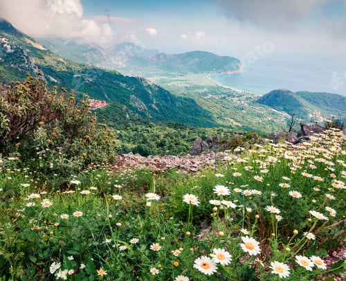 Preview: Misty Morning Seascape Of Adriatic Sea With Petrovac Town On Background. Green Summer View Of