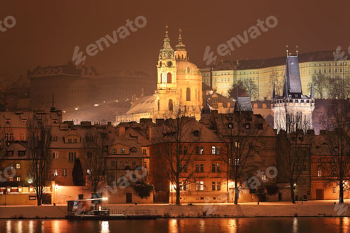 Preview: Night Romantic Snowy Prague St. Nicholas' Cathedral Above River Vltava, Czech Republic