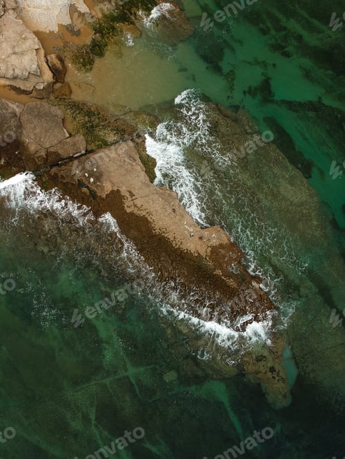 Preview: Aerial View Of The Beach On A Clear Day . Drone Shot On A Beach With Clear Sea Water.