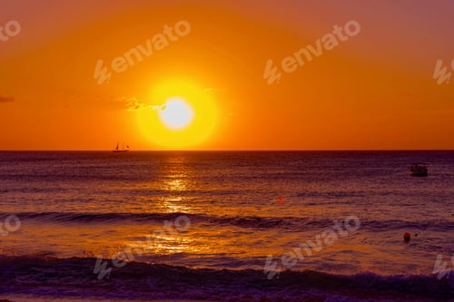 Preview: Bright And Colorful Sunset On The Caribbean Beach In Aruba Island In Winter With People On The