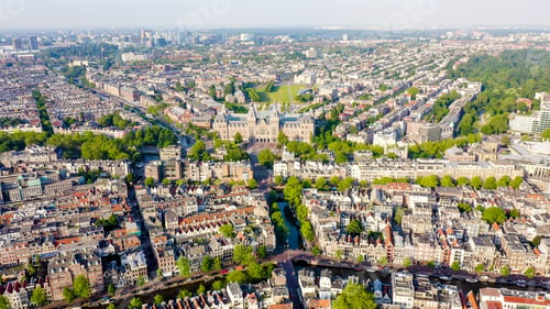 Preview: Amsterdam, Netherlands. Flying Over The Rooftops Of The City, Aerial View