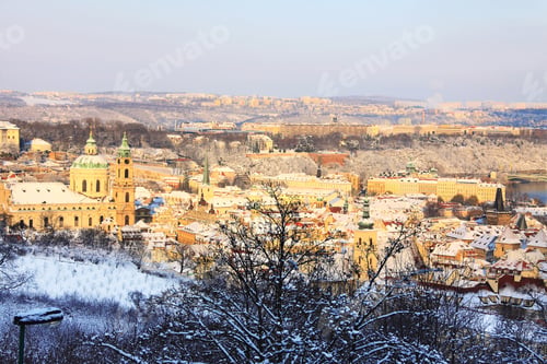 Preview: Snowy Prague St. Nicholas' Cathedral With Prague City In The Sunny Day, Czech Republic
