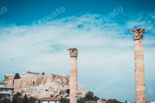 Preview: Free Standing Ancient Greek Columns With The Acropolis Of Athens In Background With Copy Space