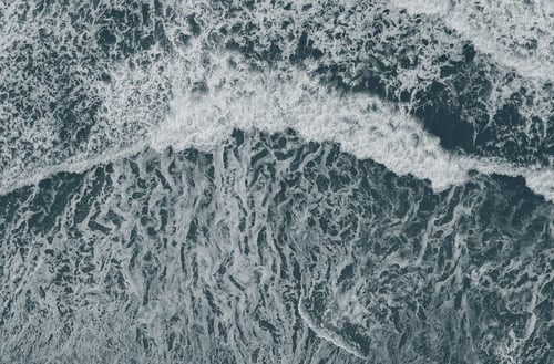 Preview: Aerial Top View Of Ocean Wave With Foam In A Sandy Beach. Drone Photo