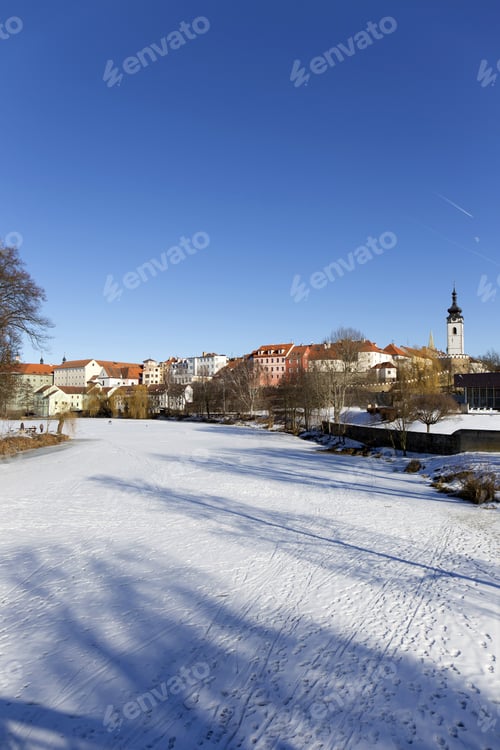Preview: Colorful Royal Snowy Medieval Town Pisek Above The Frozen River Otava, Czech Republic