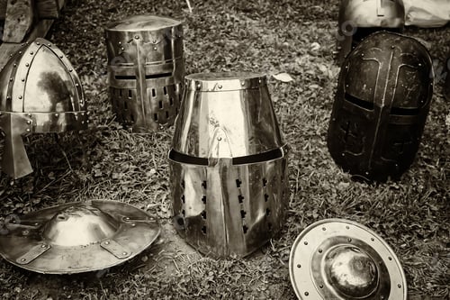 Preview: Collection of Medieval Helmets and Shields on Ground