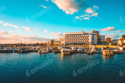 Preview: Port At Faro With Some Boats And Hotel In The Background - Cleaned Without Any Logo