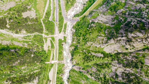 Preview: Switzerland. Picturesque Winding Mountain Road With Tunnels Gotthardstrasse, Aerial View, Head Over