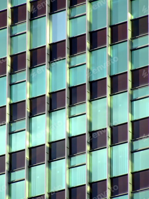 Preview: Glass Wall Of A Skyscraper With Sun Reflection