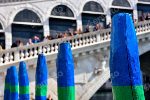 Preview: Picturesque Blue And Green Wooden Poles Near The Rialto Bridge Venice Italy