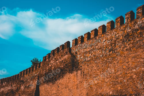 Preview: Historical Castle Wall With Fluffy Clouds