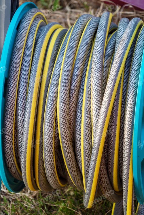 Preview: Close-Up Of Garden Hose Reel For Irrigation And Landscape Design