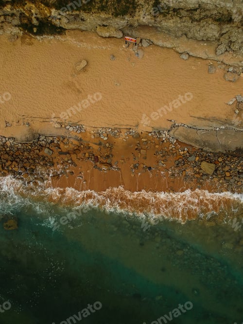 Preview: Aerial View Of Sandy Beach With Waves And Clear Ocean Water. Drone Photo