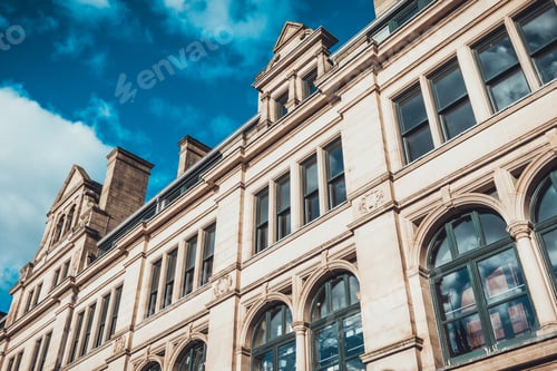 Preview: Orange Building In Old And Historical Style With An High Contrasted Sky
