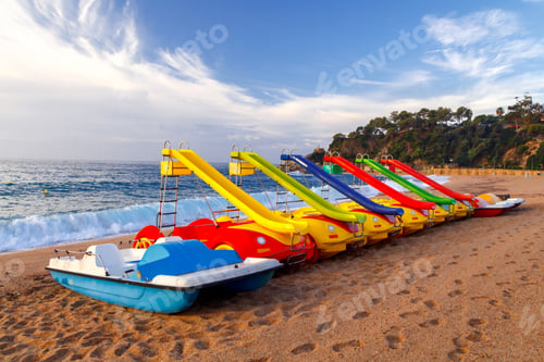 Preview: Bright Children'S Catamarans On The Beach Of Lloret De Mar In The Early Morning.