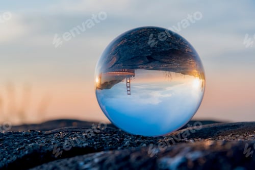 Preview: Reflections On The Glass Sphere With Warm Colors Of Dawn Over The San Francisco Bay In California